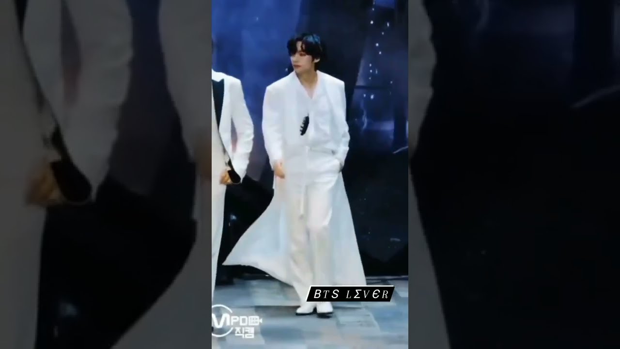 bts V in white dress nice look...killer attitude....bts lover...