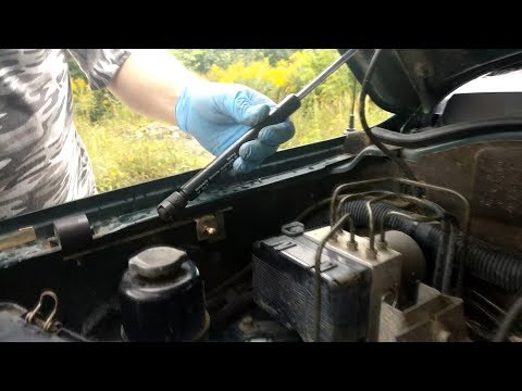 Ставим газовые упоры на капот Mitsubishi Montero Sport