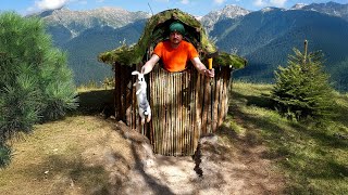 Survival Camping in a coniferous forest | The Bushcraft dugout shelter looks like a giant mushroom