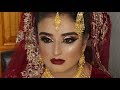 Real bride  asian bridal traditional makeup  dramatic bold winged eyes and dark red lipstick