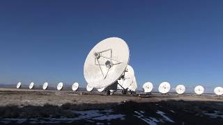 Very large array radio telescopes moving into different positions. Magdalena, NM.