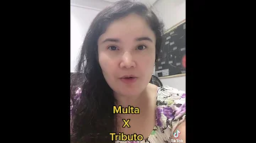 Qual é a diferença entre multa e tributo?