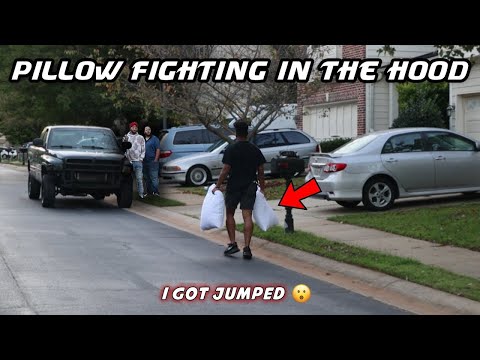 PILLOW FIGHTING STRANGERS IN PUBLIC | Hood Edition