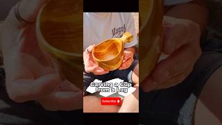 Carving a cup from a log...