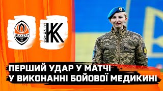 Heroic female marine soldier performed the first kick in the match between Shakhtar and Kolos