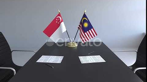 Flags of Singapore and Malaysia and Papers on the Table | Motion Graphics - Envato elements