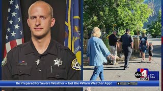 Provo police officers walk son of fallen officer to school