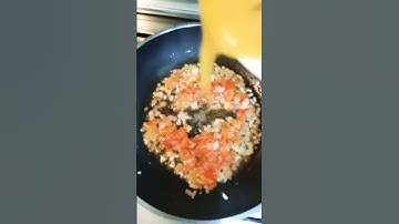 Filipino cooking egg omelette for dinner.