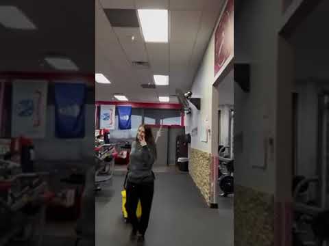 TW Working With His Client On A Good TRX Back Exercise Snapbc