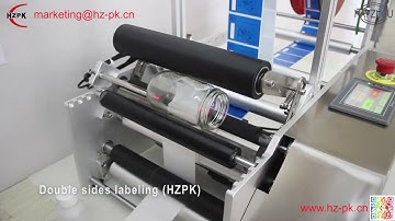 Semi-automatic round bottle double-sided labeling machine