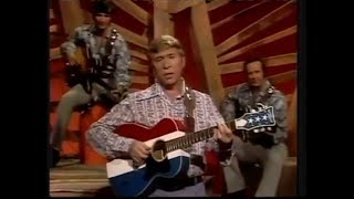 Watch Buck Owens I Am A Rock video