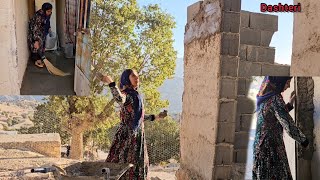 The great suffering of Leila, a nomadic woman, repairing the hut and making the door