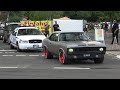 Classic us  muscle cars leaving a car show in grefrathcuda bel air chevelle roadrunnerhot rods