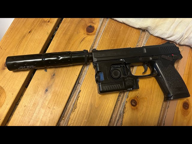 I tried attaching a suppressor to the KSC SOCOM Mk23 [Snake's gun