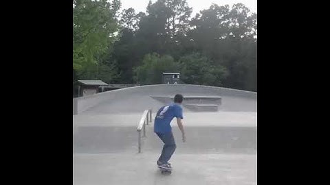Kickflip frontside boardslide slow mo