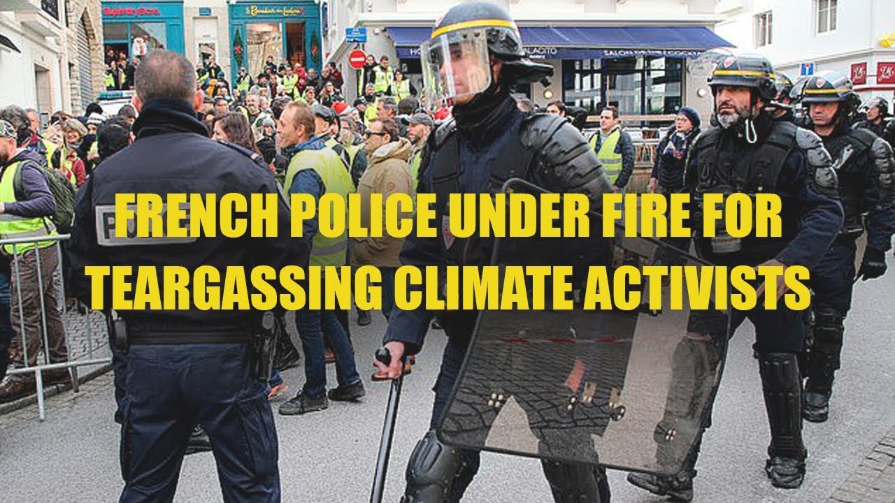 France Protests: Extinction Rebellion Protesters Sprayed With Tear Gas In Paris