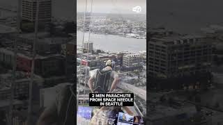 2 men parachute from Space Needle in Seattle