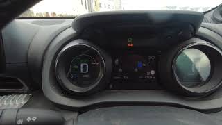 How do you use the hold function button on your Toyota Yaris hybrid