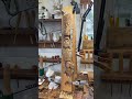 Three faces, one project, one piece of cottonwood bark is about ready for finish. #artwork