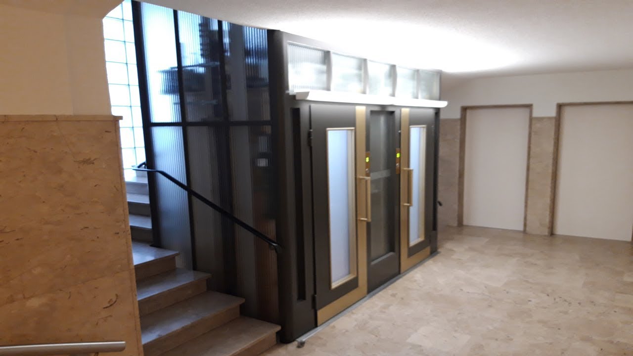 Two modernized Schindler elevators in glass shaft Luzern, Switzerland
