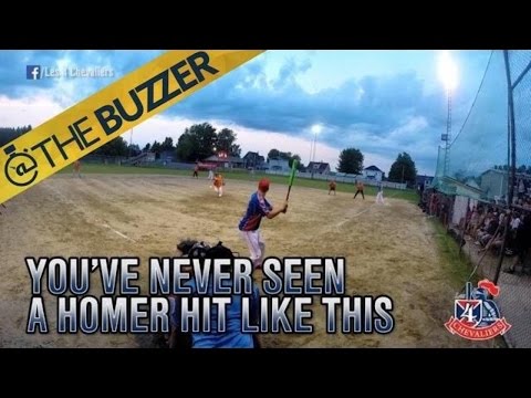 Softball player hits crazy backwards home run