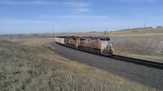Union Pacific eastbound empty coal races down the UP Overland route through Archer Hill