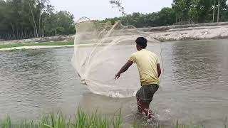 The Boy Catching Big Fish In Village River Whit Teta