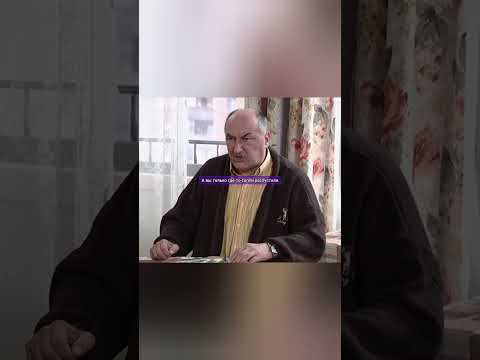 Николай Петрович гладил кролика