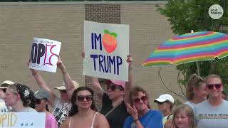Outside Trump rally in Cobb County, GA, protesters denounce president. Donald is not welcome here.