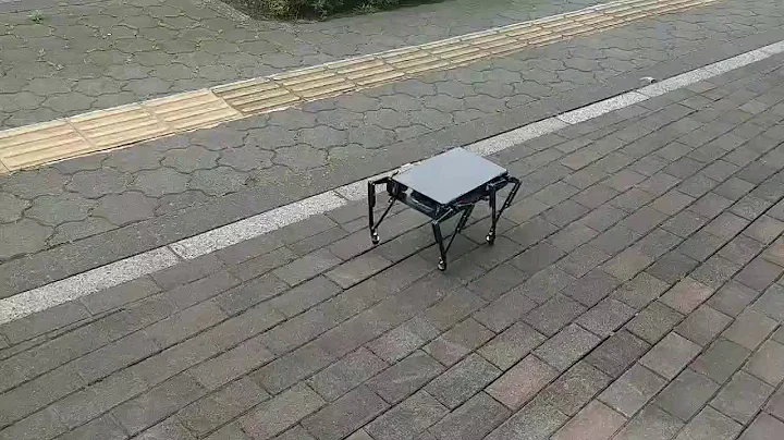 Miniature quadruped robot with five bar mechanism legs.