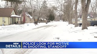 Police look for motive in shooting, standoff