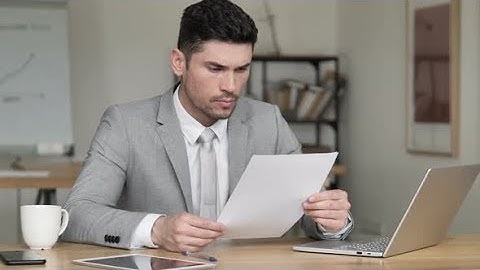 Businessman Reading Documents, Contract | Stock Footage - Videohive