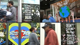 Washington DC storefronts get uplifting mural makeovers | AFP