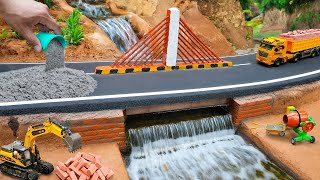 Miniature Bridge Construction with Waterfall | Toy Trucks & Excavator Road Building