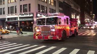 FDNY ENGINE 21 TAKING UP FROM 10-76 COMMERCIAL HIGH RISE FIRE IN MANHATTAN, NEW YORK CITY.