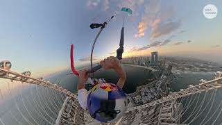 Daredevil takes historic leap from world's tallest Ferris wheel, see the stunt