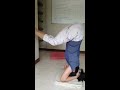 Practising Shirsasana (head stand) at home