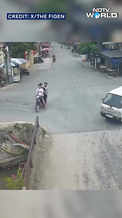 On Camera, Narrow Escape For Pillion As Bike Crashes Into Stream