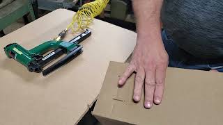 Using a plier stapler to staple a tray style box