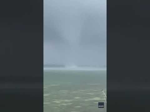 Watch: Waterspout sparks as it hits land, becomes tornado in Florida #Shorts