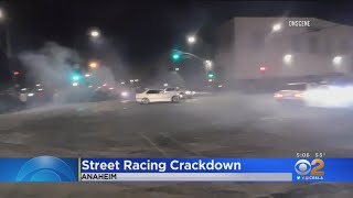 Police stopped racers from taking over the 57 freeway for street
racing.