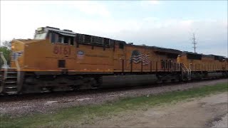 Union Pacific engine 8161 leads a mixed freight west with a horn salute