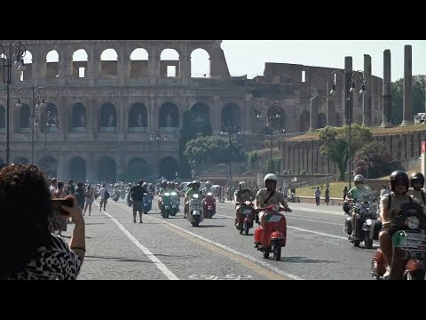 Joyful scenes in Rome as thousands celebrate 80 years of Vespa