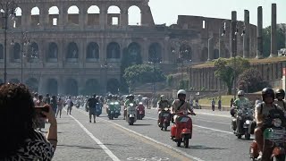 Joyful scenes in Rome as thousands celebrate 80 years of Vespa