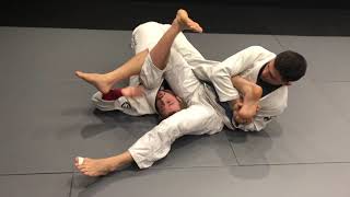 Berimbolo back take when opponent attacks the toe hold