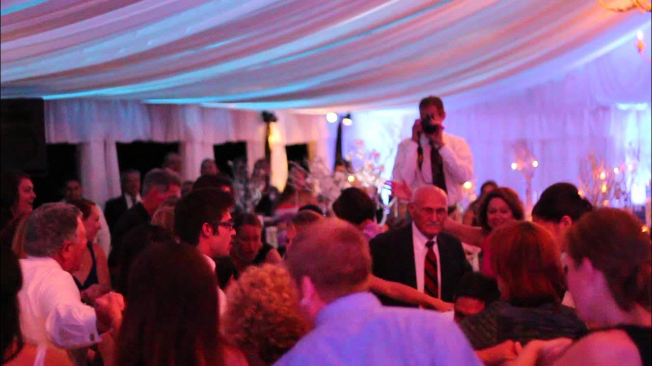 Jewish wedding tradition Lifting bride and groom in chairs YouTube