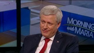 Fmr. Canada PM on conservative populism vs. socialism