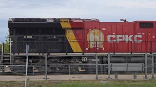 TRAINS CPKC Double Stack at Dorval with New Merger Paint Schemes 