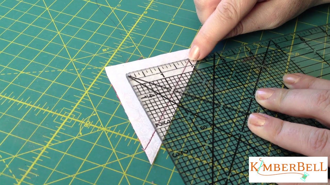 Kimberbell designs how to square up a half square triangle youtube