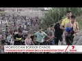 Deadly chaos at Moroccan-Spanish border | 7NEWS